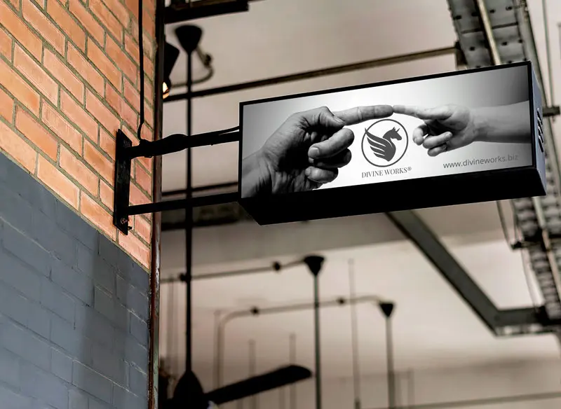Free Hanging Wall Signage Mockup by Divine Works